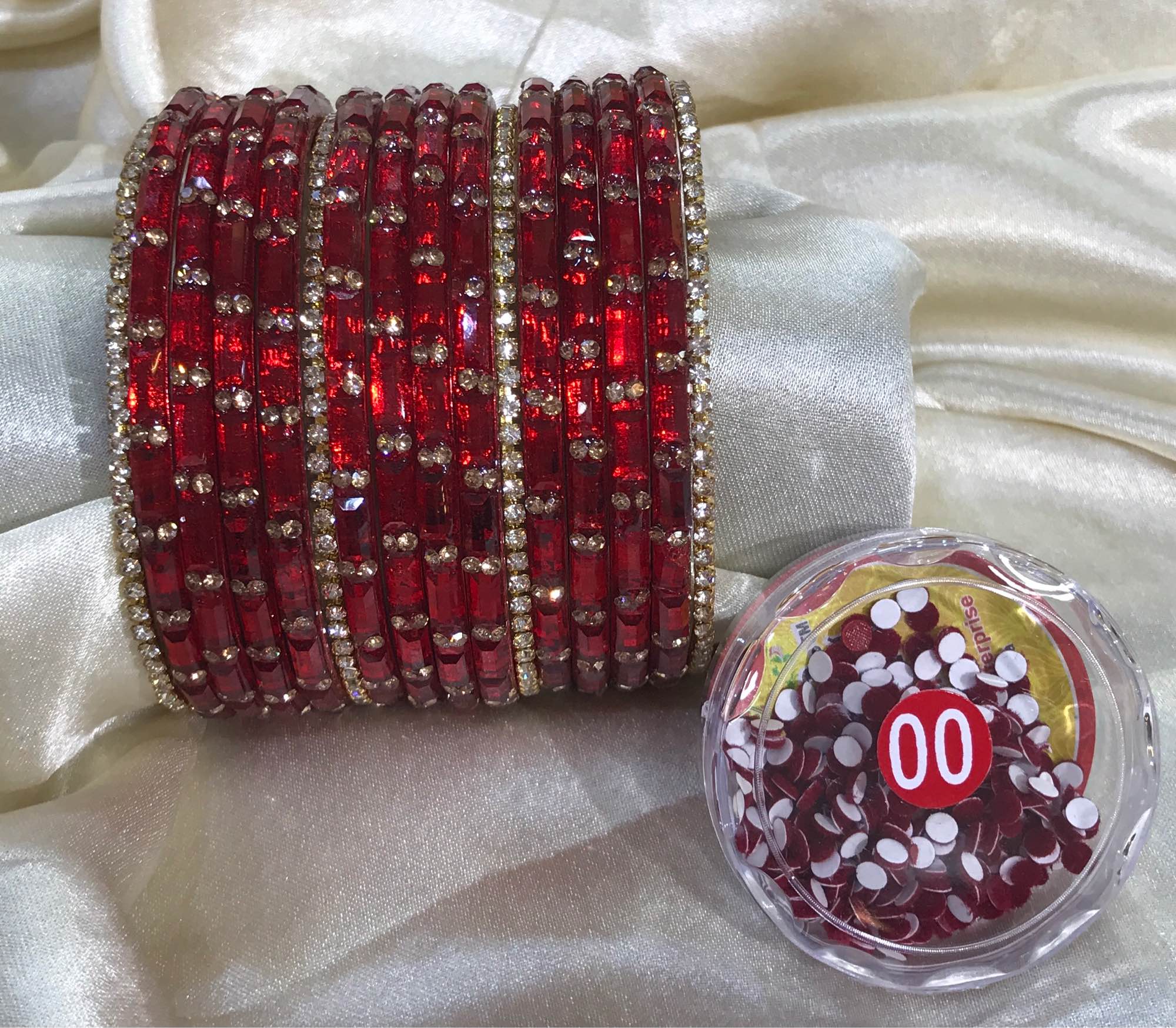 Jewels of Nepal Shrawan / Teej Unbreakable Deep Red Glass Bangles Set with Free Tika for Women