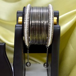 Jewels of Nepal Gunmetal Toned Faux Moti Beaded Ball Chain Drop Metal Bangles / Bala Set For Women- Set of 14 pcs