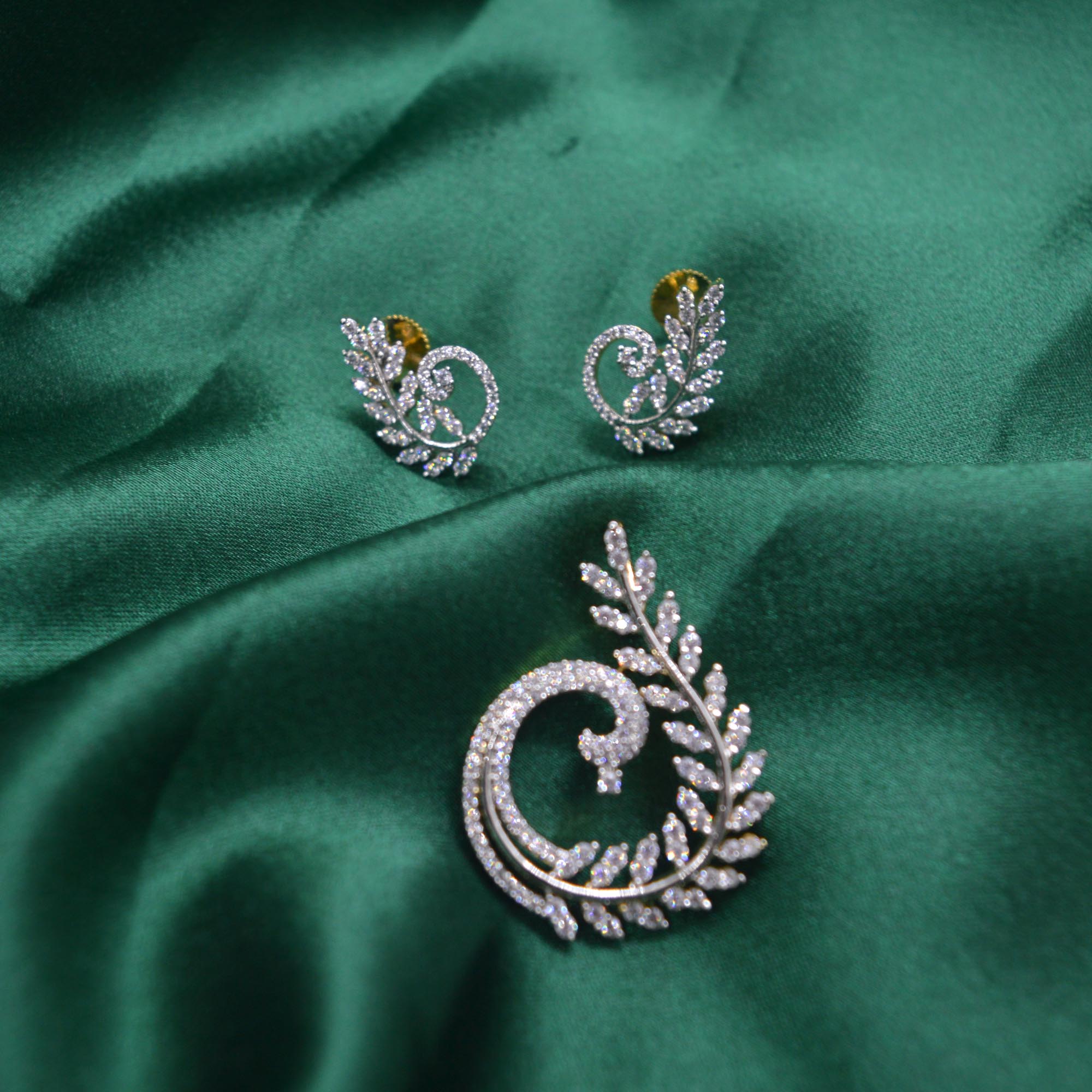 Jewels Of Nepal Cubic Zirconia 5A Australian Diamond Studded Mayur Pendant & Earrings Set For Women