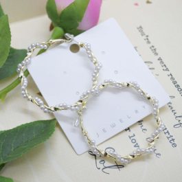 Golden/White Simulated Pearl Twirled Hoop Earrings by Jewels of Nepal