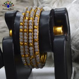 Jewels of Nepal Grey-Golden Toned Crystal Bangles Set For Women- Set of 4 pcs