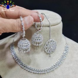 Jewels of Nepal American Diamond Studded Necklace, Pinjada Earrings & Tika Set for Women