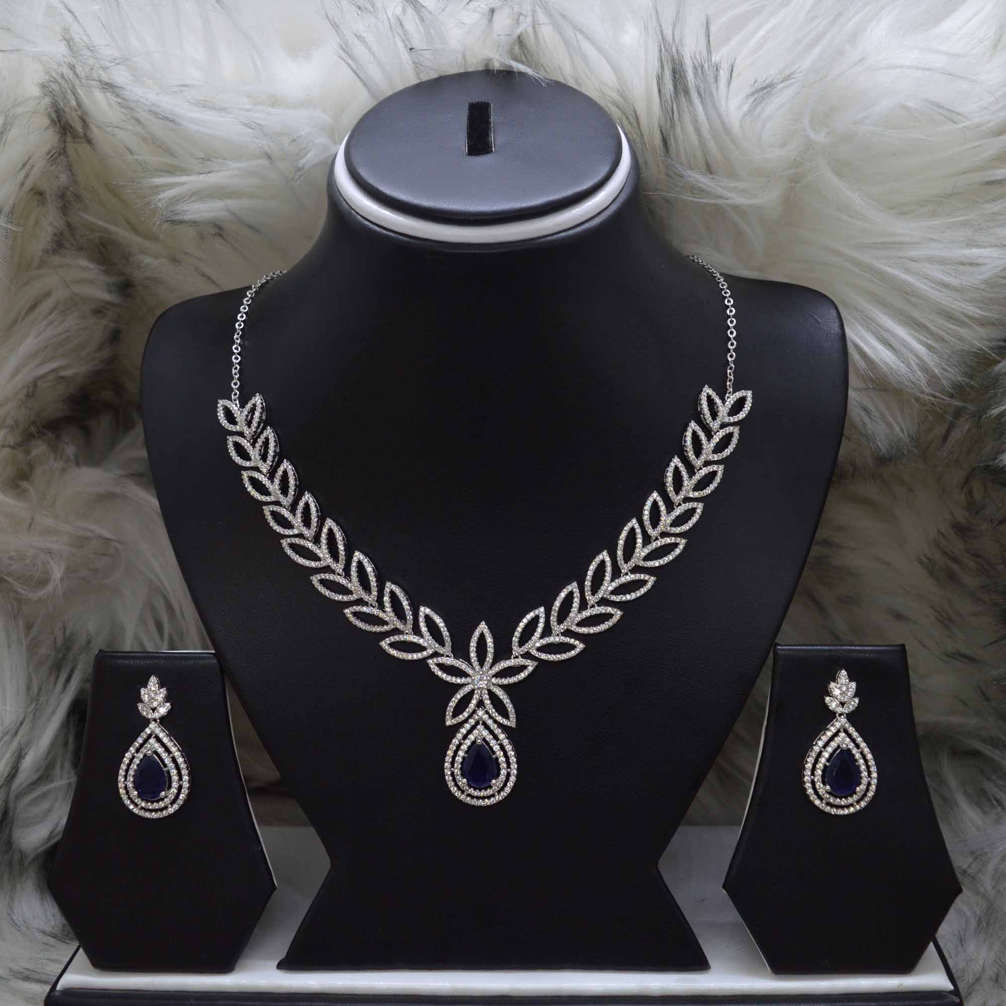 Jewels Of Nepal American Diamond Cut Patterned Leaves Designed Necklace and Earrings Set for Women