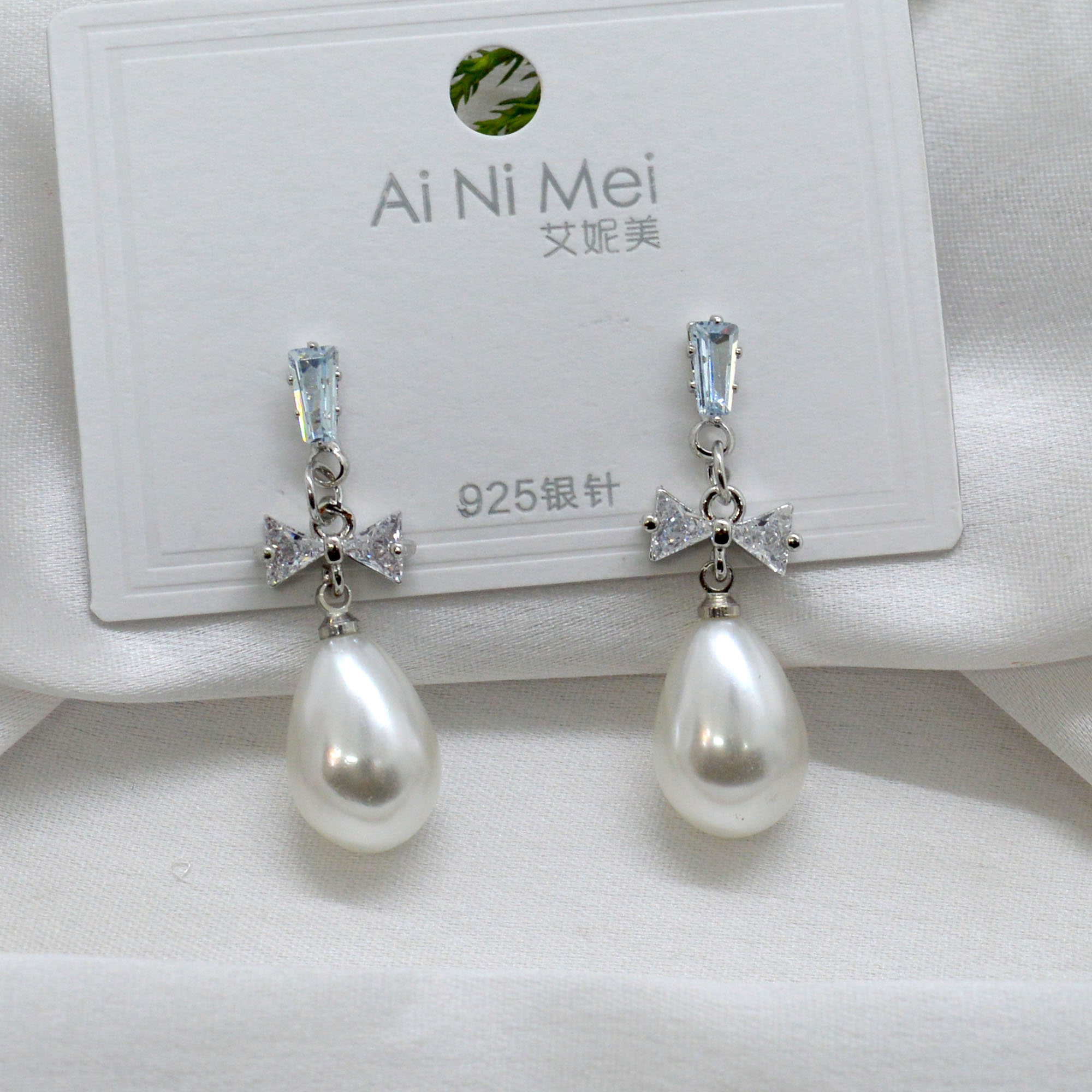 Jewels of Nepal Faux Pearl Dangling Bow Designed Korean Style Earrings For Women