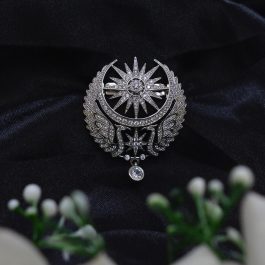 Jewels of Nepal American Diamond Studded Sun Star and Peacock Designed Brooch for Women