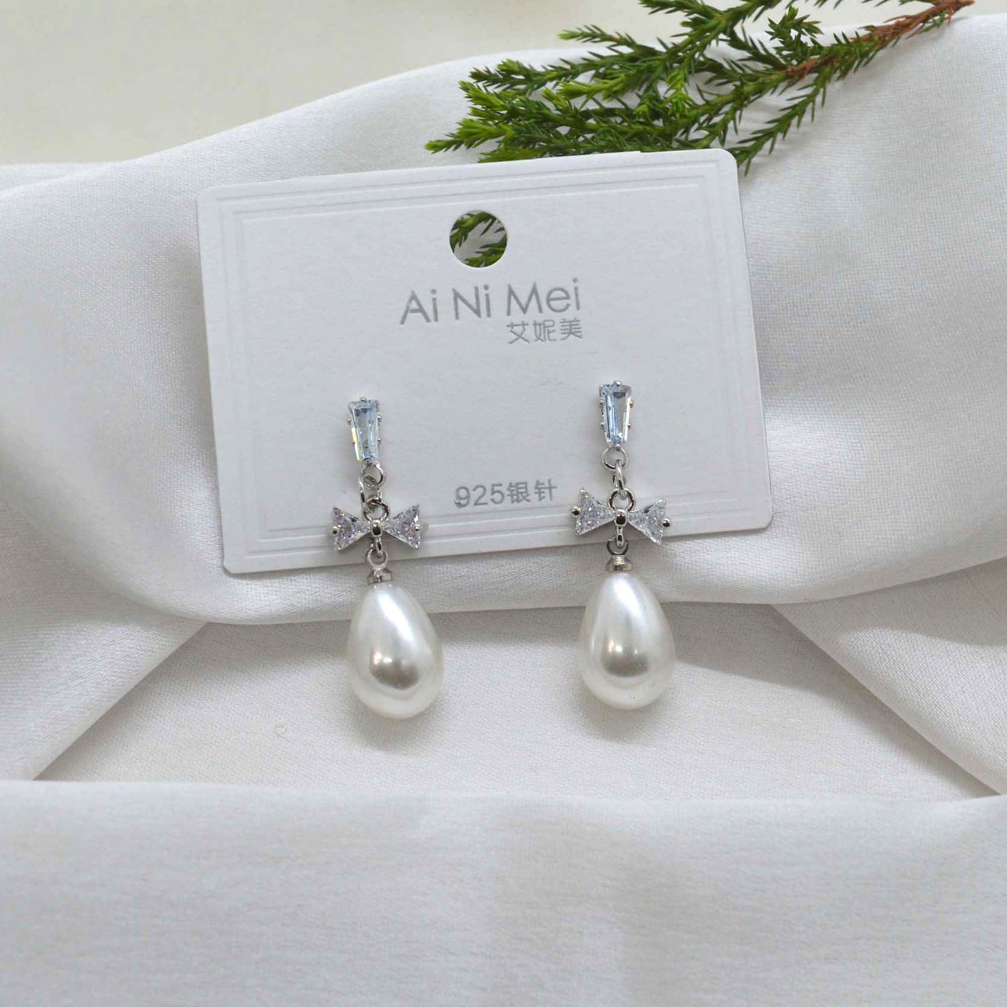 Jewels of Nepal Faux Pearl Dangling Bow Designed Korean Style Earrings For Women - Image 2