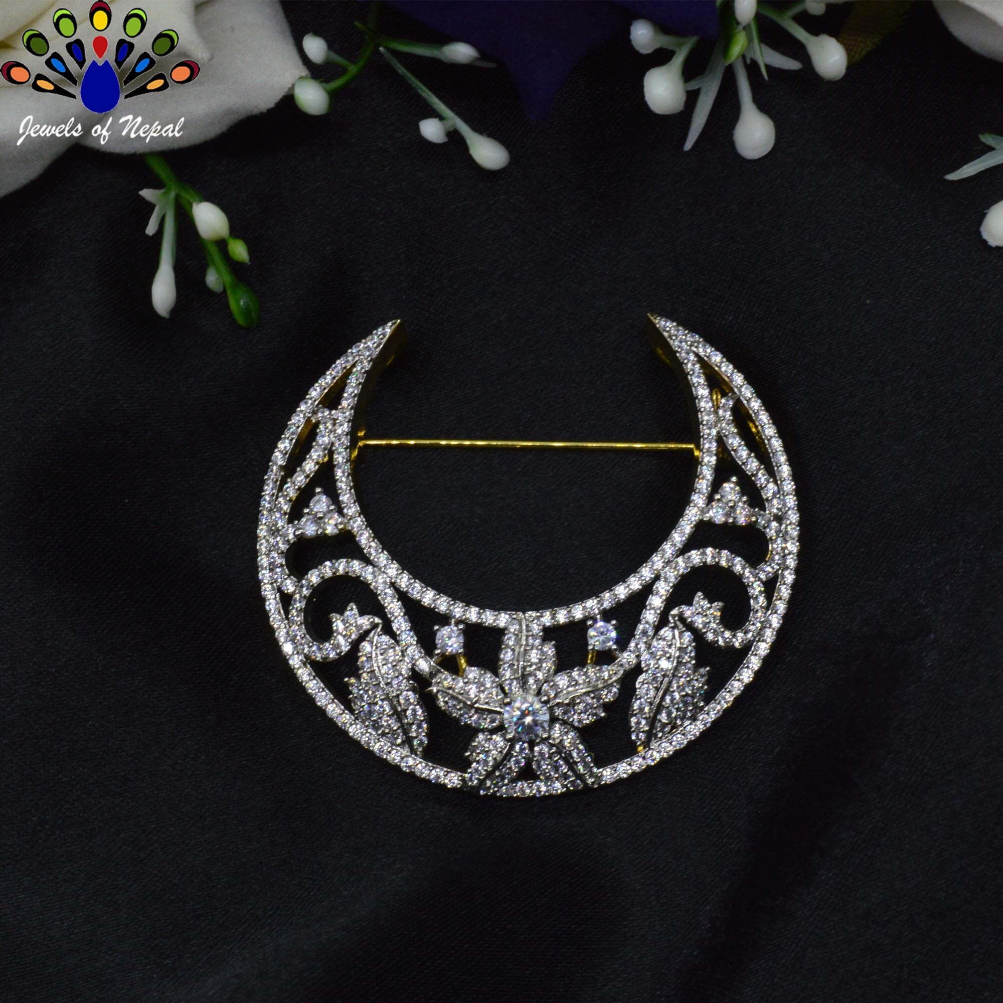 Jewels of Nepal Imitation Diamond (American Diamond) 5A Grade CZ Studded Leaves Patterned Crescent Moon Designed Brooch for Women