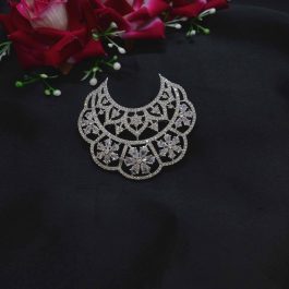 Jewels of Nepal American Diamond Studded Crescent Shaped Designer Brooch for Women