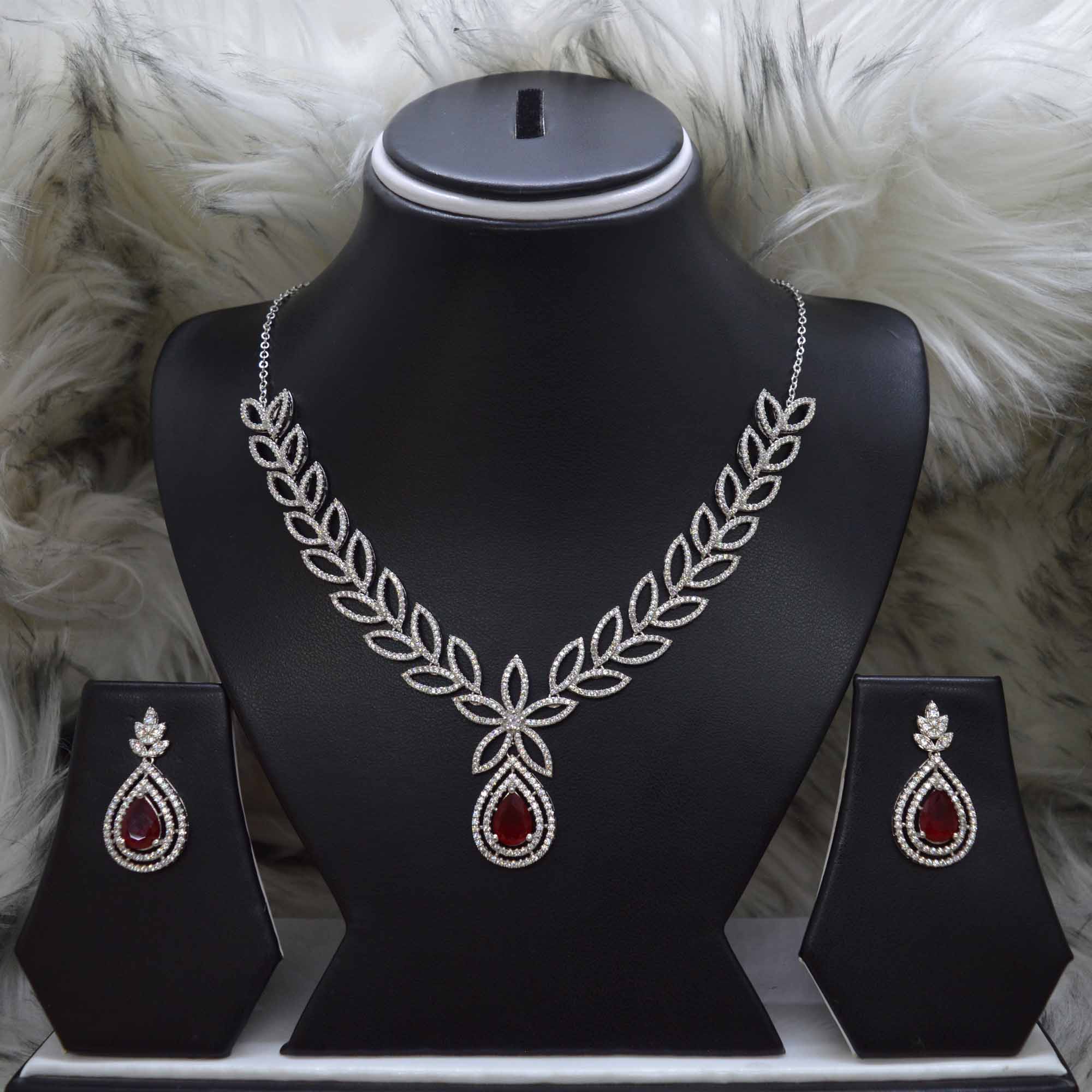 Jewels Of Nepal American Diamond Cut Patterned Leaves Designed Necklace and Earrings Set for Women - Image 2