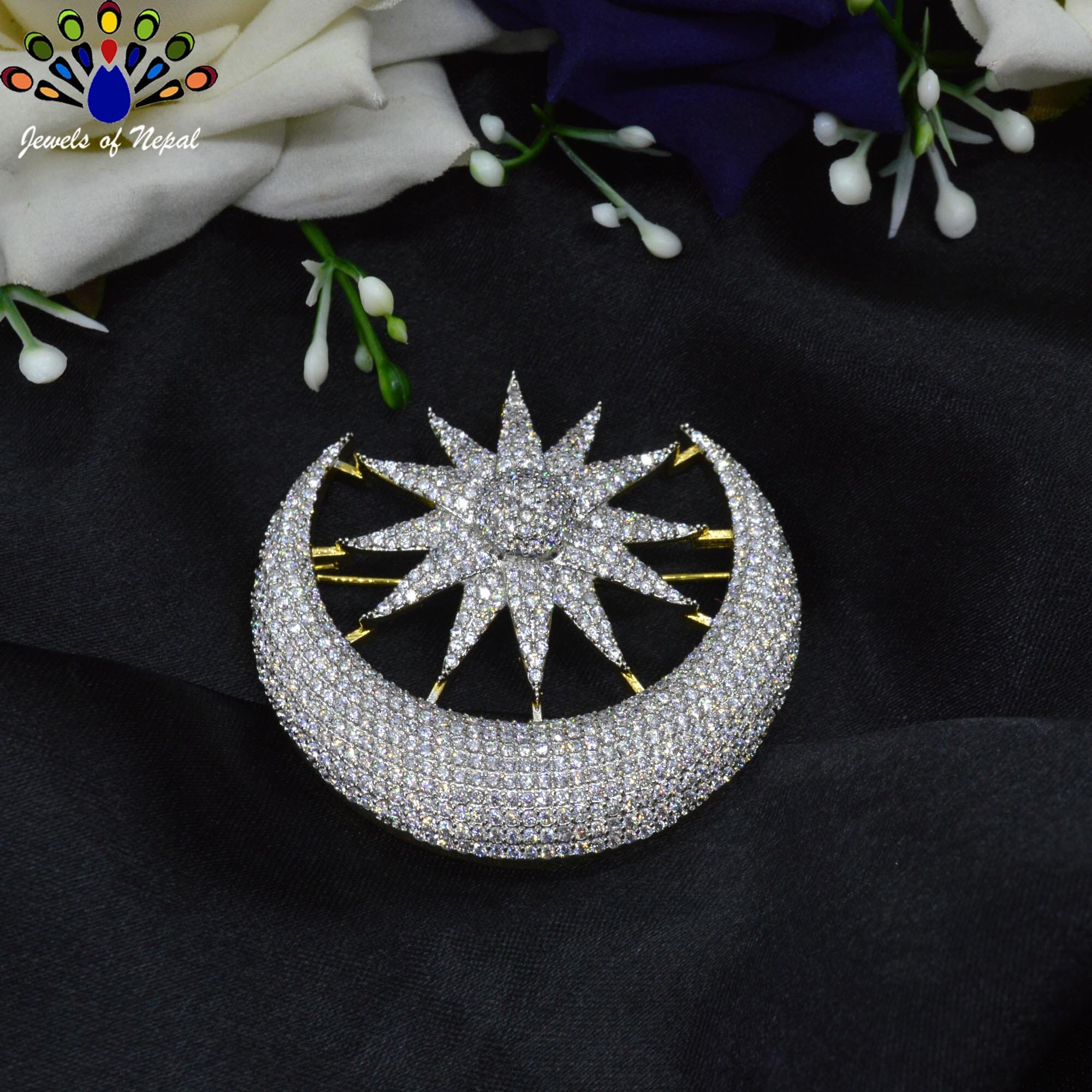Jewels of Nepal Imitation Diamond (American Diamond) 5A Grade CZ Studded Crescent Moon and Sun Designed Brooch for Women